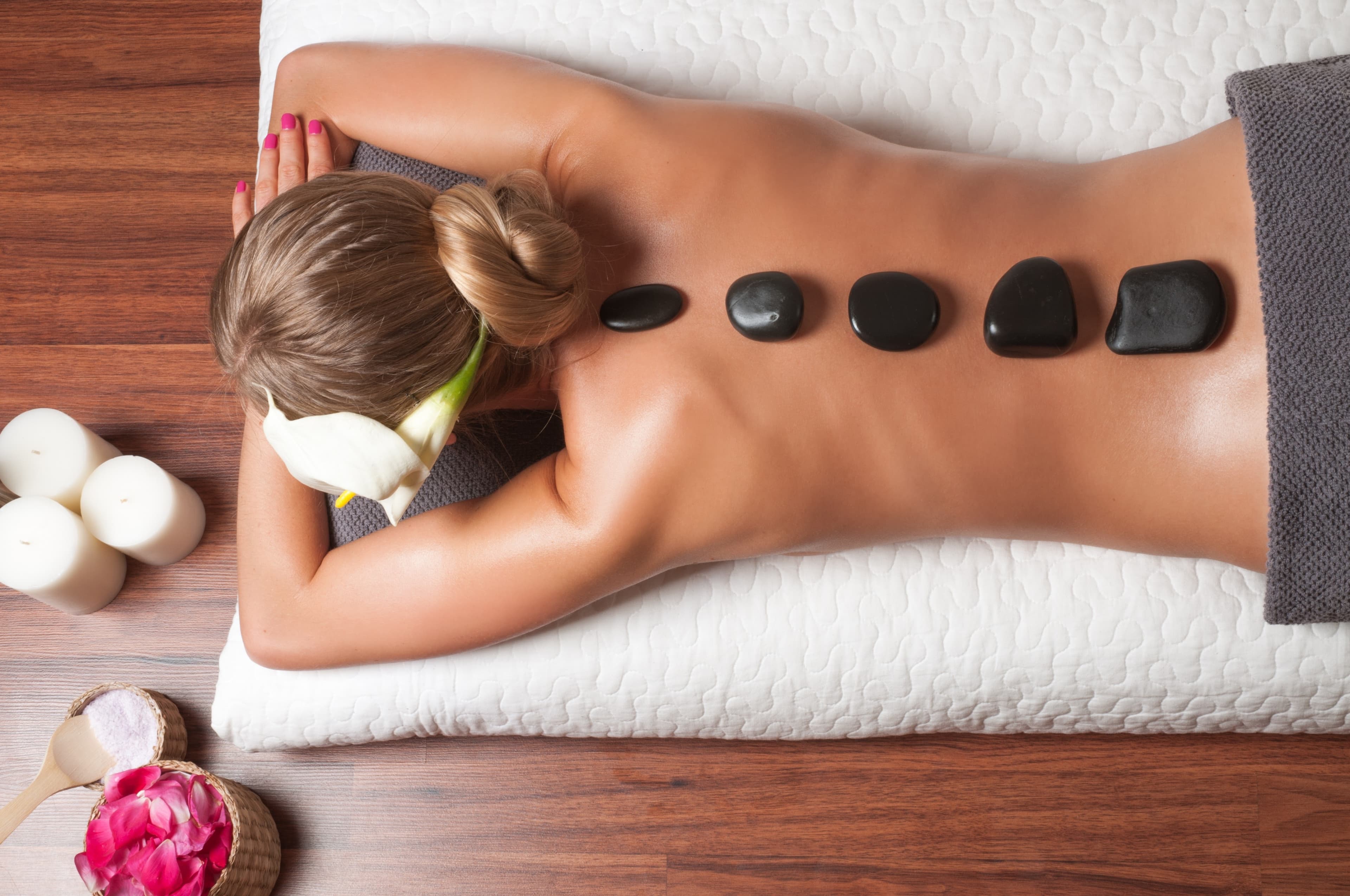 Hot Stone Therapeutic Massage - Image 1